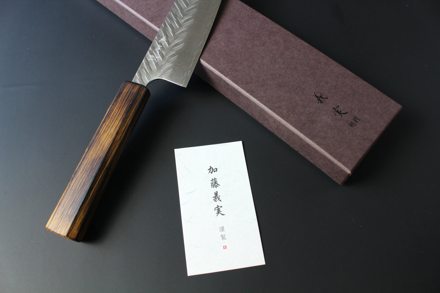 Yoshimi Kato - SG2 V hammered Santoku Knife 170mm with lacquered burned oak handle